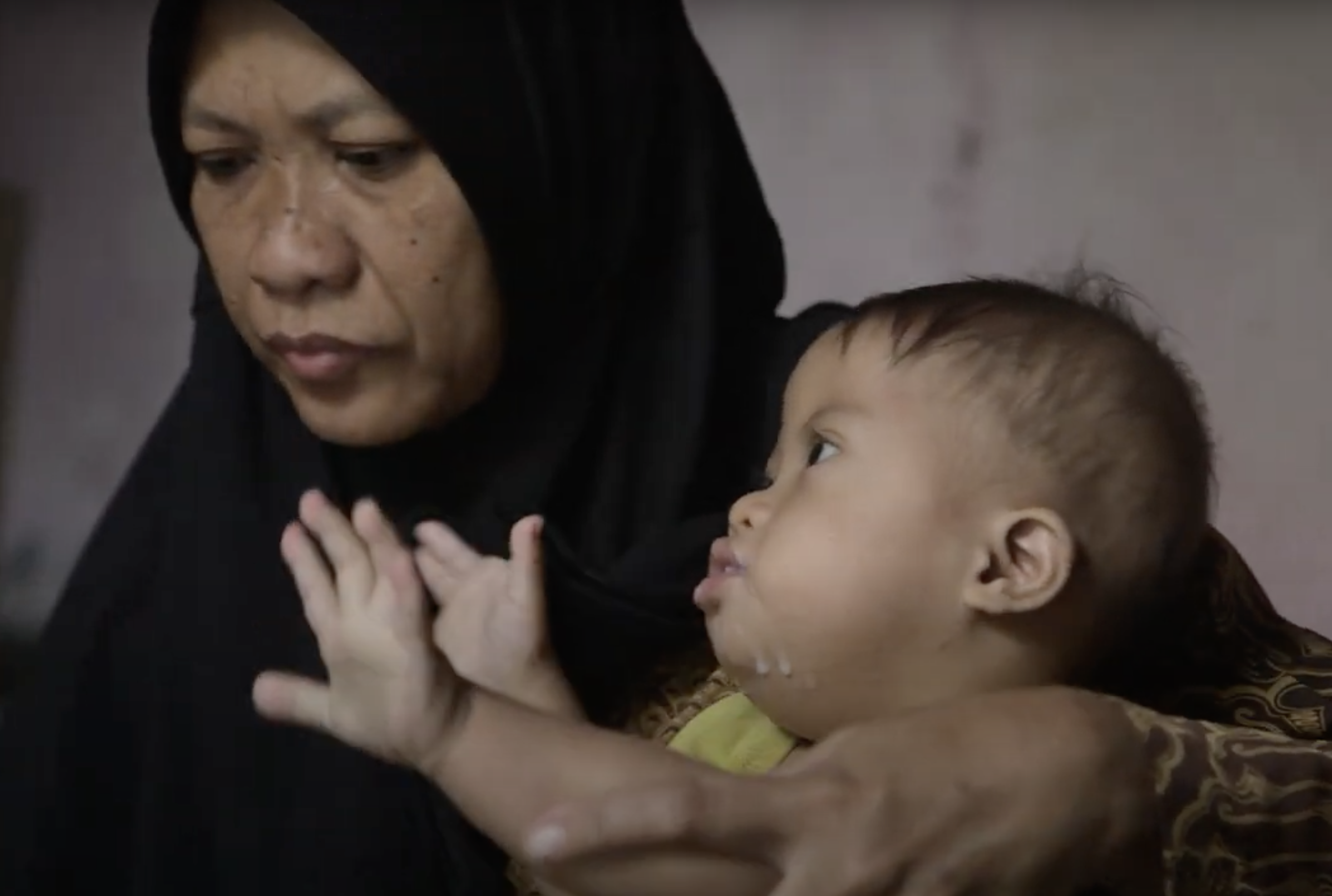 Mother holding baby